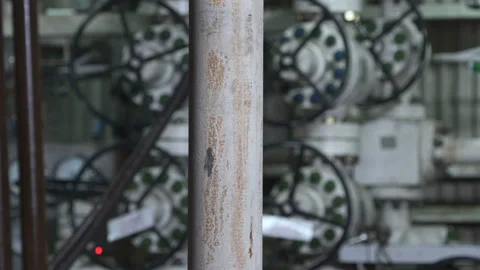 Drilling platform. Drill pipe rotates. BOP valves in background. Drill floor Stock Footage 196257700