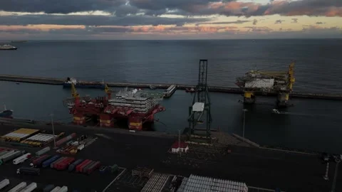 Drilling platform operations unfold amid stunning Tenerife sunset vistas Stock Footage 295455779