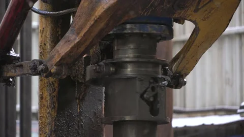 Drilling platform. Pipe rotates. Drilling process. Pipe Holder. Close-up Stock Footage 169960389