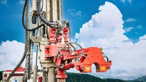 Drilling rig is active at a resource site conducting drilling for oil and gas Stock Photos