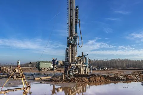 Drilling rig close-up at a construction site. Deep hole drilling. Photos