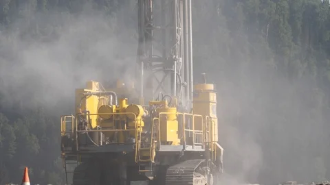 Drilling rig in the coal open pit. Drilling holes for explosives in the quarry Stock Footage 94601560
