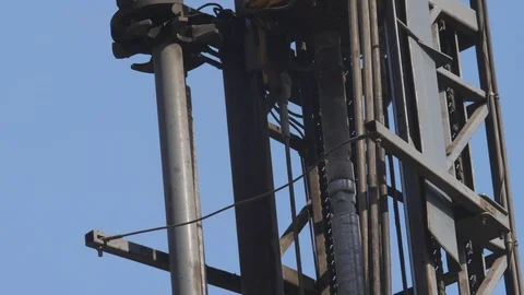 Drilling rig in the coal open pit. Drilling holes for explosives in the quarry Stock Footage 94602063