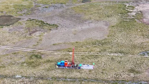Drilling Rig Conducting Geological Survey in Arid Landscape Tibet China Stock Footage 346570880