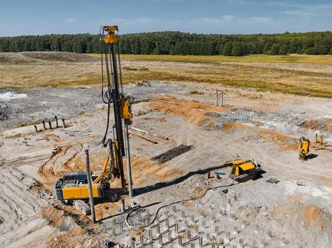 Drilling rig for constructing new mine on pile field Stock Photos