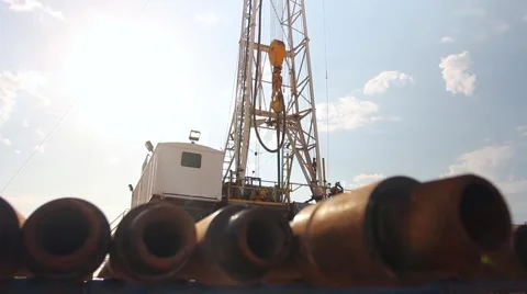 Drilling Rig Dolly Past Drill Pipe Stock-Footage 40723113
