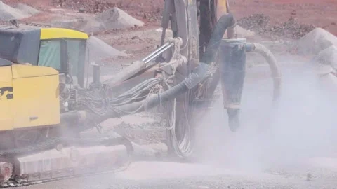 Drilling Rig Drilling Blast Holes at an Open Pit Mine During Surface Mining.. Stock Footage 339145598