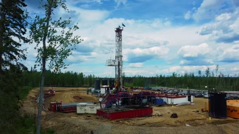 Drilling Rig, Generators, and Crew Camp on an Oilfield Lease, Alberta, Canada Stock Footage 341918863
