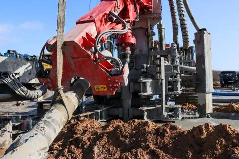 Drilling rig. Installing an expander for a deep well. Photos