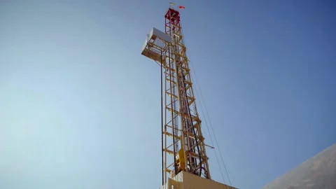 Drilling rig in operation, drilling a well, close-up, ukraine flag Stock Footage 142494691