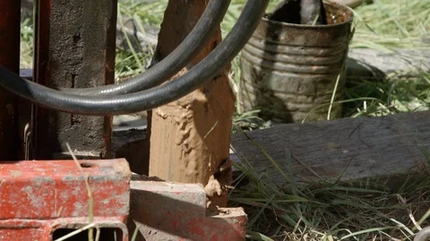 Drilling rig pulling out drill pipe with geological core sample from borehole Stock Footage 123648445