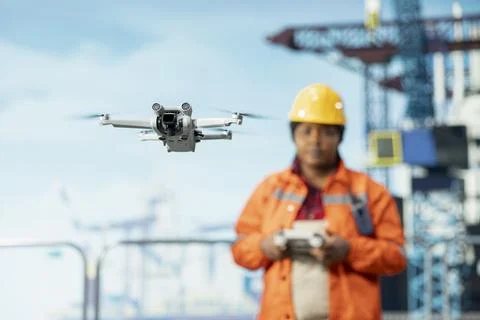 Drilling rig specialist using drone for evaluation of hard to reach areas Stock Photos