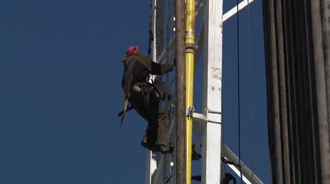 Drilling Rig Worker Climing Derrick with Fall Protection 스톡 동영상 49473645