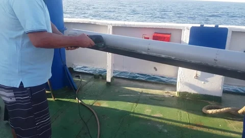 Drilling Rig Worker Taking Out Geological Rock Core Samples From Drill Pipe Stock Footage 138752396