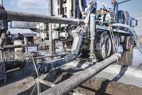 A drilling rig is working on a site. Deep hole drilling Photos