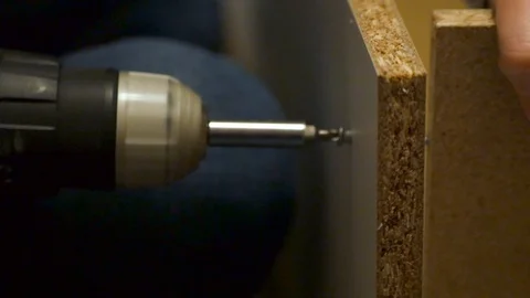 Drilling a screw into a flatpack cupboard 動画素材 122206386