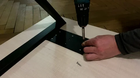 Drilling Screws while driving into wooden material. Stock Footage 171003773