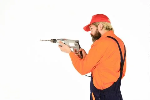 For drilling solid wall you need masonry bit. Man in cap with drills white Foto stock