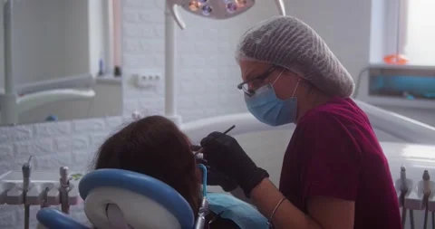 Drilling teeth in the dentist's chair 動画素材 154872722