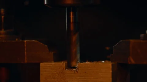 Drilling through a metal block Stock Footage 275444860