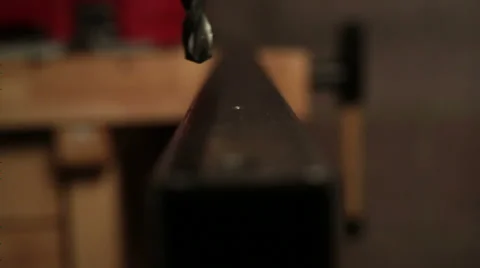Drilling through Metal Slow Motion big bit Stock Footage 37324688