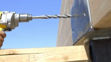 Drilling through wood Stock Footage 86140110