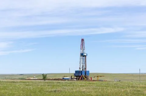 Drilling tower in the steppe Stock Photos