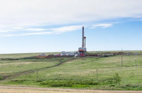Drilling tower in the steppe Stock Photos