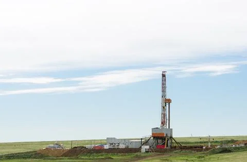 Drilling tower in the steppe Stock Photos