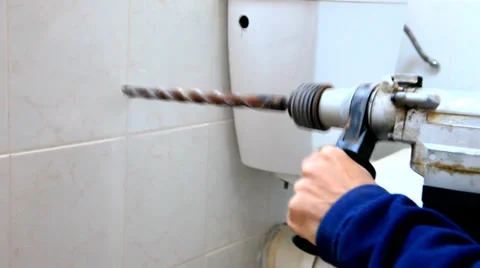 Drilling a wall Stock Footage 34526335