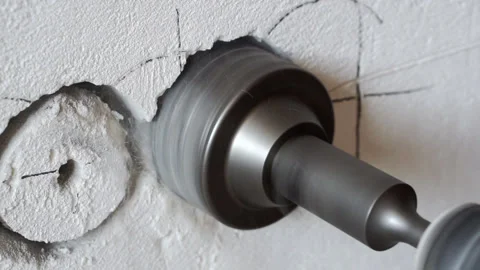 Drilling the wall to install the socket. Stock Footage 242190574