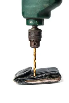 Drilling a wallet Stock Photos