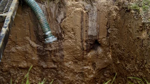 Drilling for water to create a well in the ground during the day Stock Footage 336792516