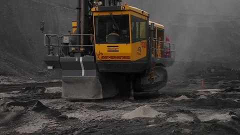 Drilling of the wells by drilling rig (coal open pit)  Stock Footage 83575505