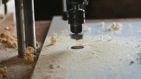 Drilling wide hole in the chipboard Stock Footage 106800243