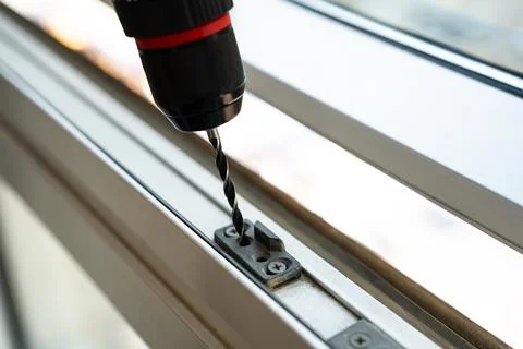 Drilling Window Frame Hardware Installation Stock Photos