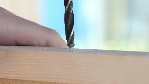 Drilling wood with a drill close-up Video stock 199099963