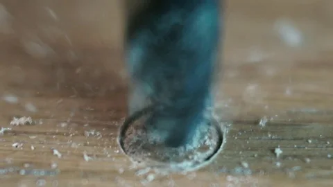 Drilling wood panel slowmotion Macro (close-up) Stock Footage 75502892