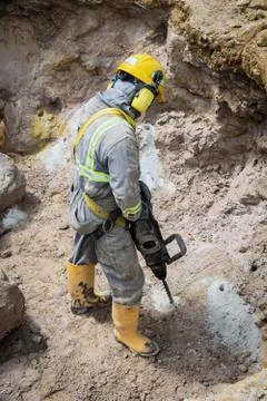 Drilling worker in action Stock Photos