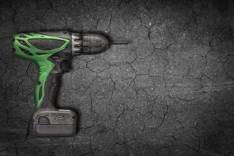 Drills with background cracking Stock Photos