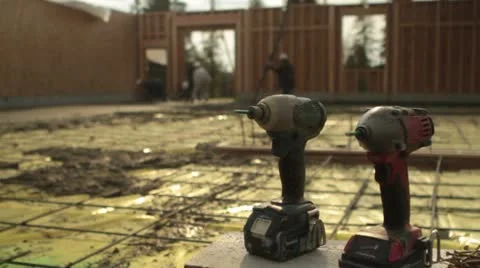 Drills with construction site in background Stock Footage 21556213