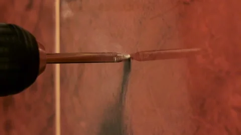 Drills A Hole In Ceramic Tile Stock Footage 62843006