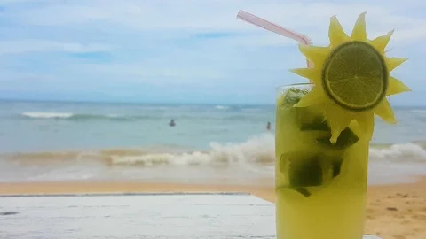 Drink on Beach Bluse Sky Sand in 4K Zoom Out 스톡 동영상 127458515