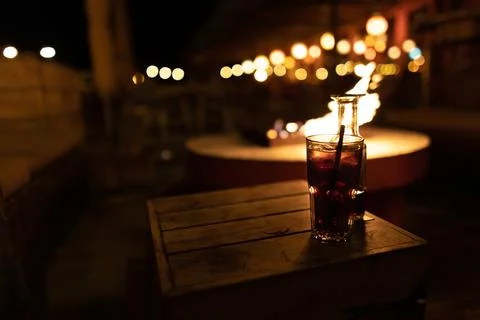 A drink in a bear at the beach 스톡 사진