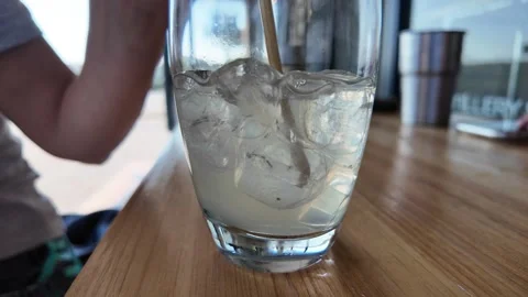 Drink being stirred at a cafe Stock Footage 276091529