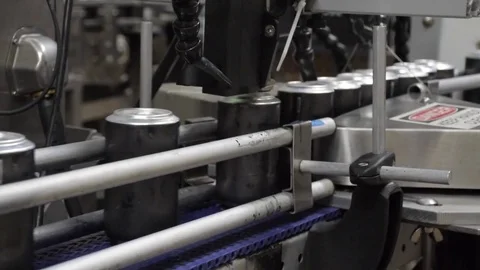 Drink Cans on Conveyor Stock Footage 81748704