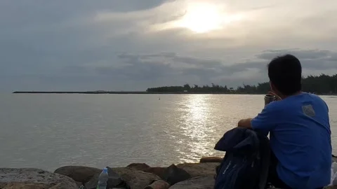 Drink coffee by the beach Stock Footage 300743478