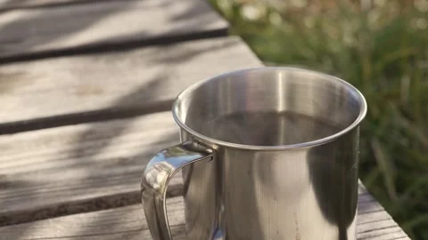 Drink coffee on an outdoor bench Stock Footage 321662311
