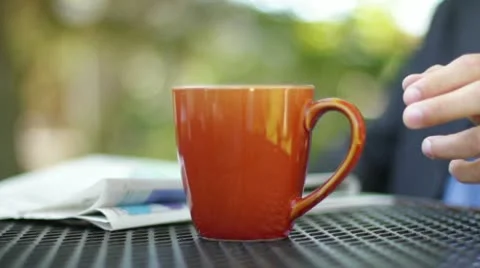 Drink Coffee - Read Newspaper Stock Footage 12288886