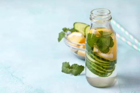Drink with cucumber, lemon Stock Photos